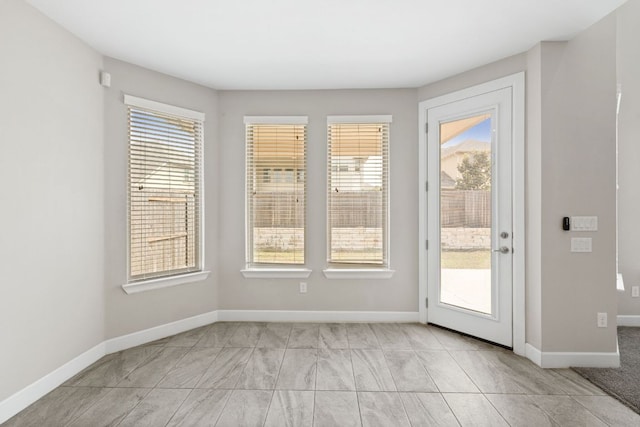 829 Expedition Way, Round Rock, TX 78665 - doorway to outside with baseboards