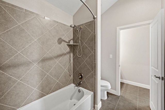 829 Expedition Way, Round Rock, TX 78665 - bathroom with washtub / shower combination, tile patterned flooring, and vaulted ceiling