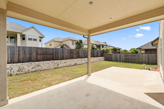 829 Expedition Way, Round Rock, TX 78665 - fenced backyard with a patio area and a residential view