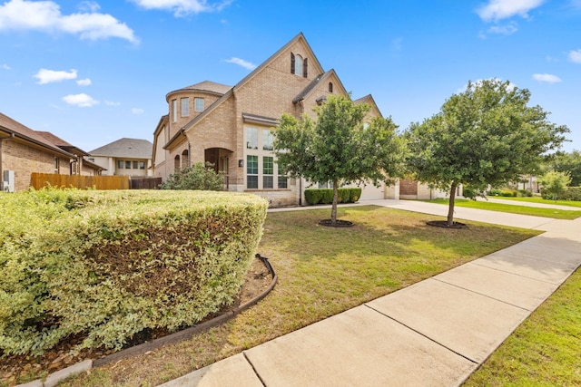 829 Expedition Way, Round Rock, TX 78665 - view of front of house featuring concrete driveway and brick siding