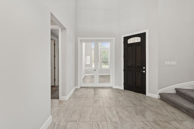 829 Expedition Way, Round Rock, TX 78665 - foyer entrance featuring french doors, stairs, and a high ceiling