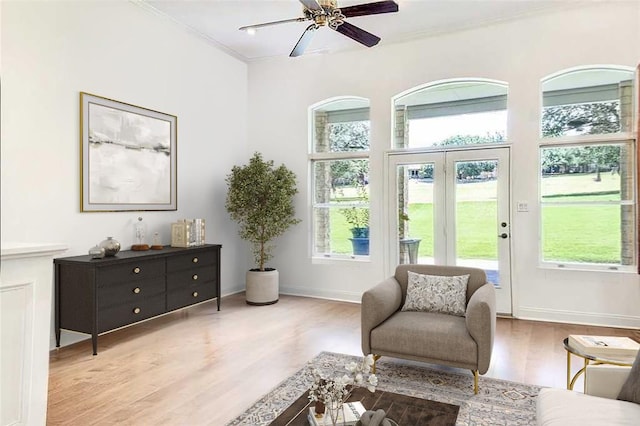 93 Duck Lake Dr, Lakeway, TX 78734 - sitting room with wood finished floors, ceiling fan, baseboards, and crown molding