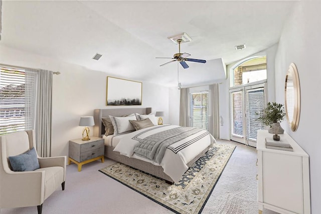93 Duck Lake Dr, Lakeway, TX 78734 - carpeted bedroom with access to exterior and ceiling fan