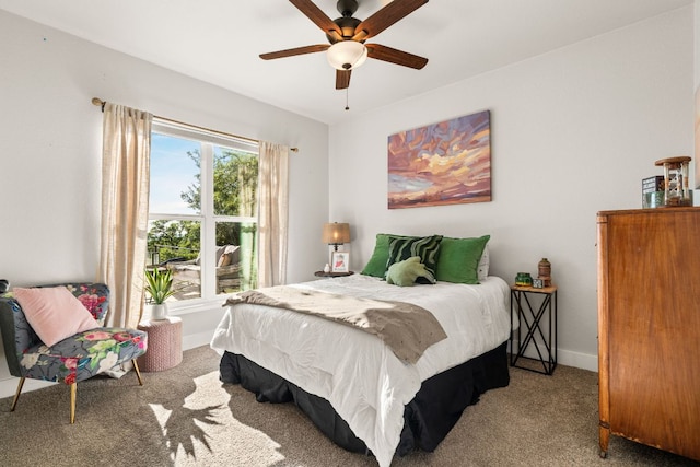 101 Durango Dr, Johnson City, TX 78636 - carpeted bedroom featuring a ceiling fan and baseboards