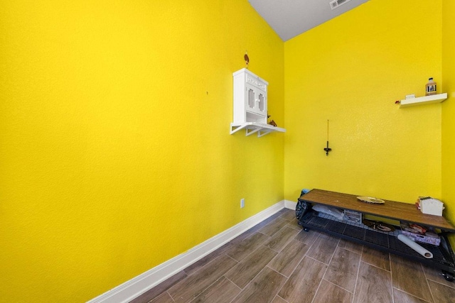 3750 E Palm Valley Blvd Unit 98, Round Rock, TX 78665 - washroom featuring dark wood-style floors, visible vents, and baseboards