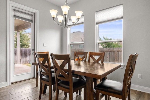 3750 E Palm Valley Blvd Unit 98, Round Rock, TX 78665 - dining room with a chandelier and light wood-type flooring