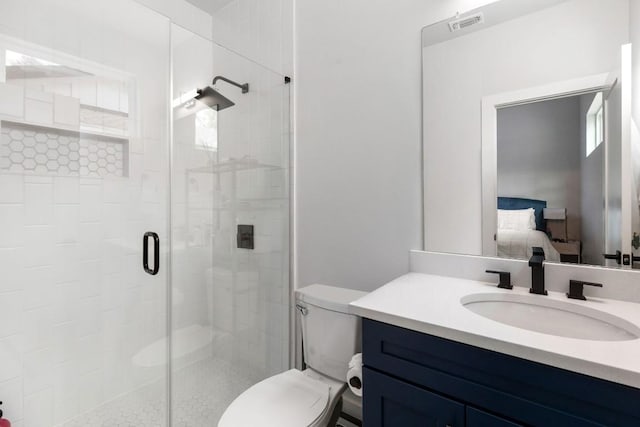 506 Thrasher Ln Unit 2, Austin, TX 78741 - ensuite bathroom with a stall shower, toilet, vanity, and plenty of natural light