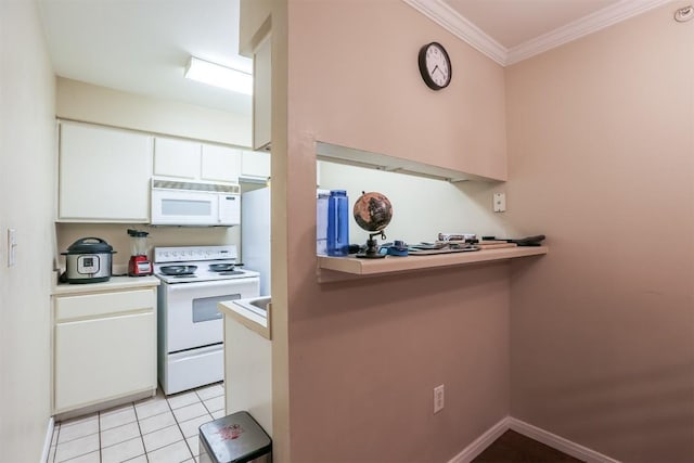 kitchen featuring crown molding, white cabinets, light countertops, light tile patterned flooring, and white appliances