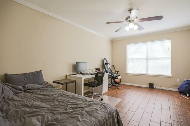 bedroom featuring wood finished floors, ceiling fan, crown molding, and baseboards