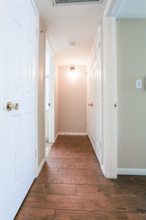 501 W 26th St Unit 312, Austin, TX 78705 - hall with hardwood / wood-style floors and baseboards
