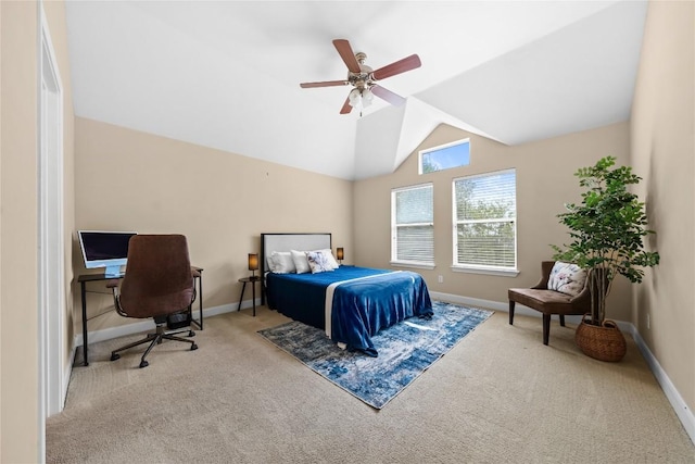 carpeted bedroom with baseboards, ceiling fan, and vaulted ceiling