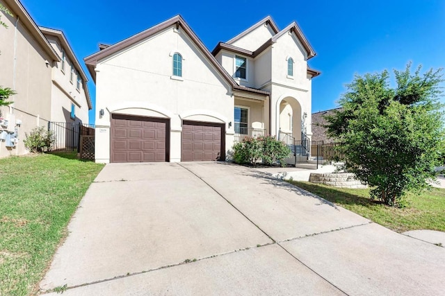3909 Vinalopo Dr, Austin, TX 78738 - view of front of property with a garage, concrete driveway, and stucco siding