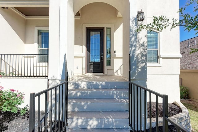 3909 Vinalopo Dr, Austin, TX 78738 - view of exterior entry featuring stucco siding