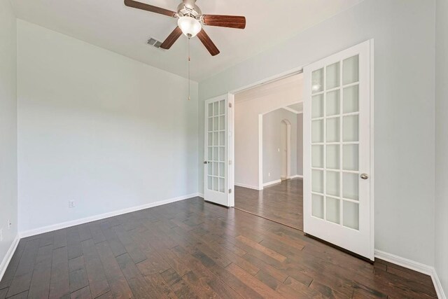3909 Vinalopo Dr, Austin, TX 78738 - unfurnished room with french doors, dark wood finished floors, baseboards, and ceiling fan