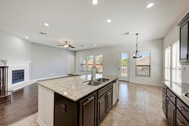 3909 Vinalopo Dr, Austin, TX 78738 - kitchen featuring a sink, recessed lighting, dishwasher, ceiling fan, and open floor plan