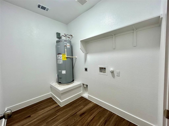 128 Heleakala Dr, Bastrop, TX 78602 - clothes washing area with hookup for a washing machine, water heater, baseboards, hookup for an electric dryer, and visible vents