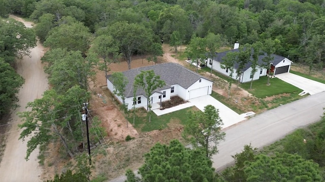 128 Heleakala Dr, Bastrop, TX 78602 - aerial view featuring a forest view
