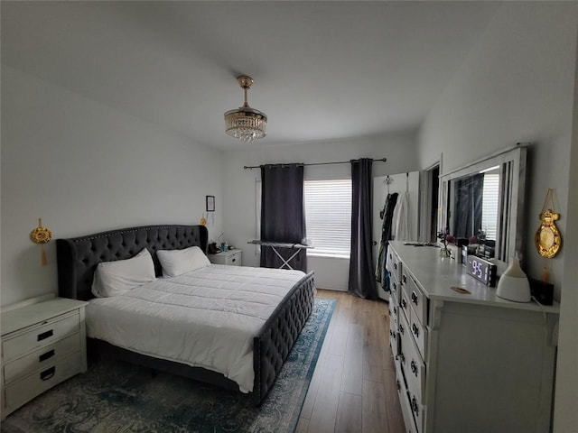 bedroom featuring wood finished floors