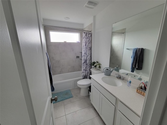 bathroom with vanity, shower / bath combo with shower curtain, tile patterned floors, toilet, and visible vents
