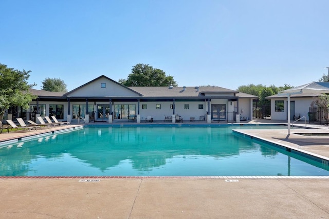 pool featuring a patio area