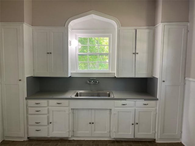 kitchen with white cabinets and a sink