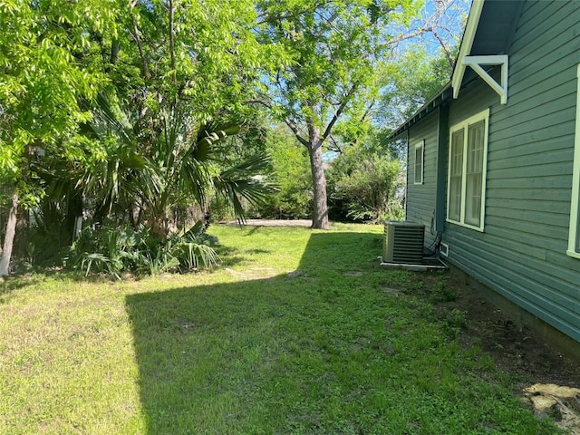 view of yard featuring central AC