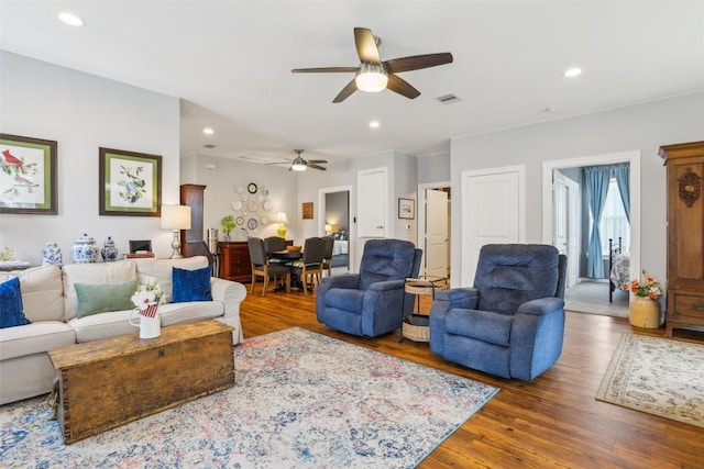 103 Bonham Ln, Paige, TX 78659 - living room with a ceiling fan, wood finished floors, and recessed lighting