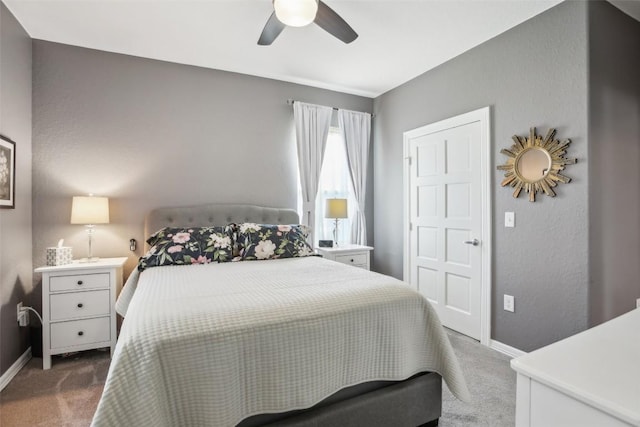 103 Bonham Ln, Paige, TX 78659 - carpeted bedroom featuring baseboards and a ceiling fan
