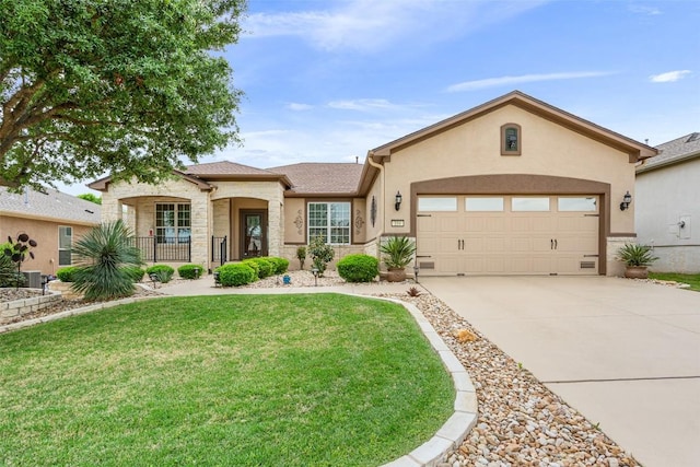 104 Emory Peak Trl, Georgetown, TX 78633 - view of front facade featuring a front lawn, a garage, stucco siding, concrete driveway, and stone siding