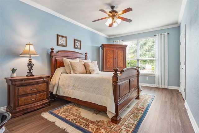 104 Emory Peak Trl, Georgetown, TX 78633 - bedroom featuring dark wood-type flooring, crown molding, and ceiling fan