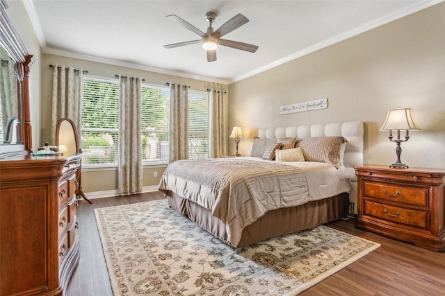 104 Emory Peak Trl, Georgetown, TX 78633 - bedroom with dark wood-type flooring, ornamental molding, and ceiling fan