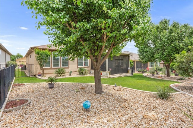 104 Emory Peak Trl, Georgetown, TX 78633 - back of house with a sunroom and stucco siding