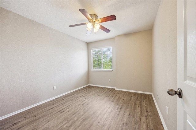 4108 Whitecrest Cv, Round Rock, TX 78681 - spare room featuring wood finished floors and a ceiling fan