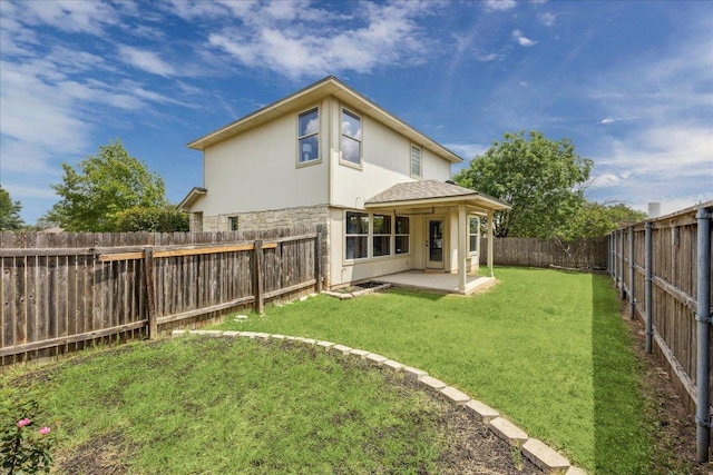 4108 Whitecrest Cv, Round Rock, TX 78681 - back of property with a patio, a fenced backyard, stone siding, stucco siding, and roof with shingles
