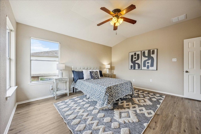 4108 Whitecrest Cv, Round Rock, TX 78681 - bedroom with wood finished floors, lofted ceiling, and ceiling fan