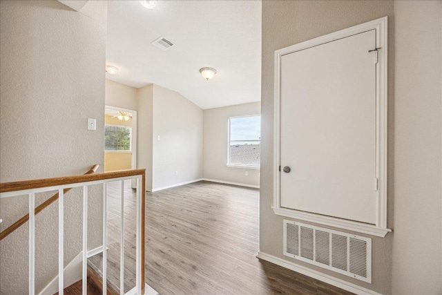 4108 Whitecrest Cv, Round Rock, TX 78681 - hall with wood finished floors and an upstairs landing