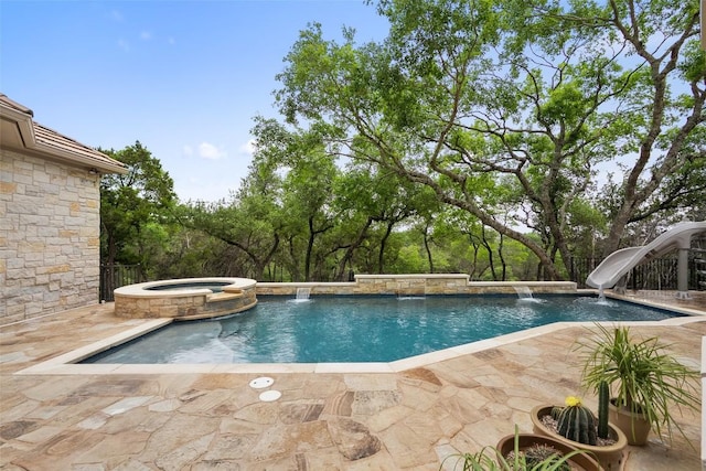7800 Aspen Highlands Dr, Austin, TX 78746 - view of swimming pool with a patio, a pool with connected hot tub, and a water slide