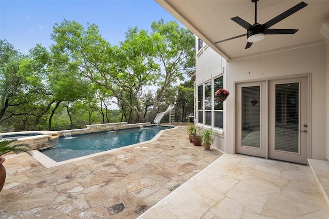 7800 Aspen Highlands Dr, Austin, TX 78746 - view of pool with a water slide, a patio, a ceiling fan, and a pool with connected hot tub
