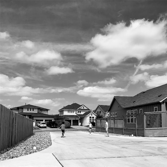 7901 Donnelley Dr, Austin, TX 78744 - exterior space featuring fence and a residential view