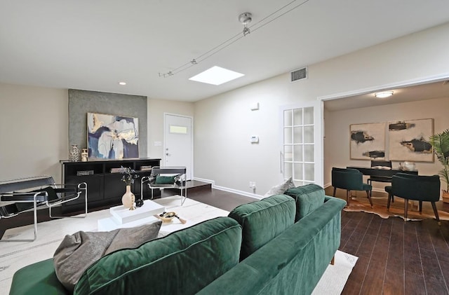 2115 Ann Arbor Ave Unit B, Austin, TX 78704 - living room with dark wood-style flooring, baseboards, and recessed lighting