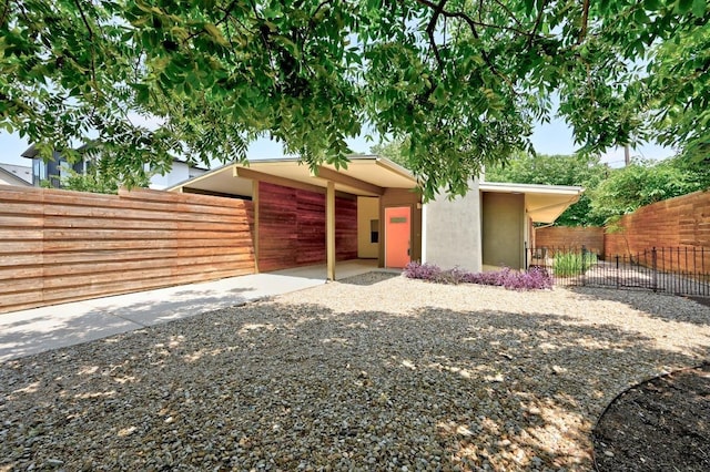 2115 Ann Arbor Ave Unit B, Austin, TX 78704 - rear view of property featuring stucco siding