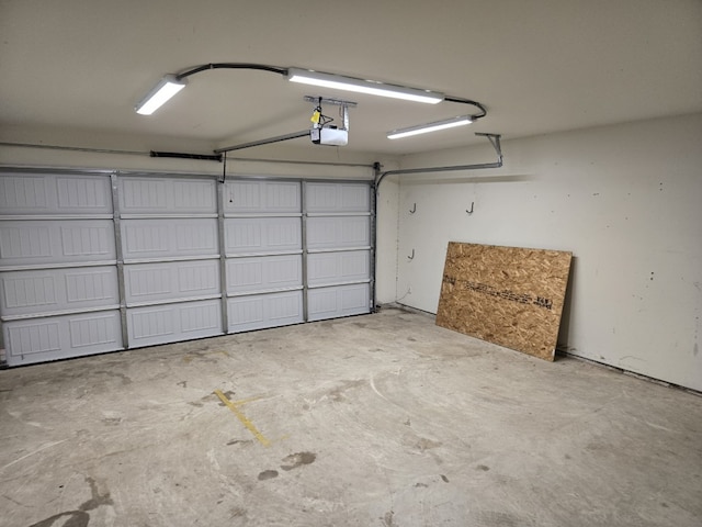 1337 Violet Ln, Kyle, TX 78640 - garage featuring a garage door opener