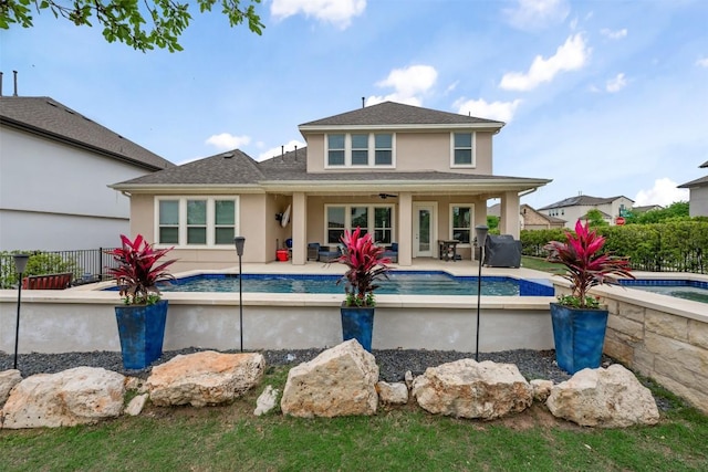 1728 Siena Sunset Rd, Leander, TX 78641 - rear view of property with stucco siding, a ceiling fan, a patio, and a shingled roof