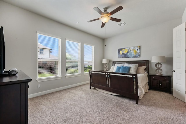 1728 Siena Sunset Rd, Leander, TX 78641 - carpeted bedroom featuring baseboards, a ceiling fan, and visible vents
