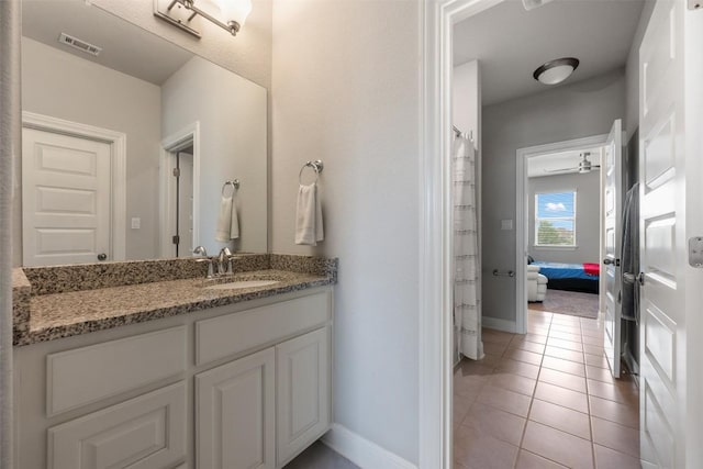 1728 Siena Sunset Rd, Leander, TX 78641 - bathroom featuring vanity and tile patterned flooring
