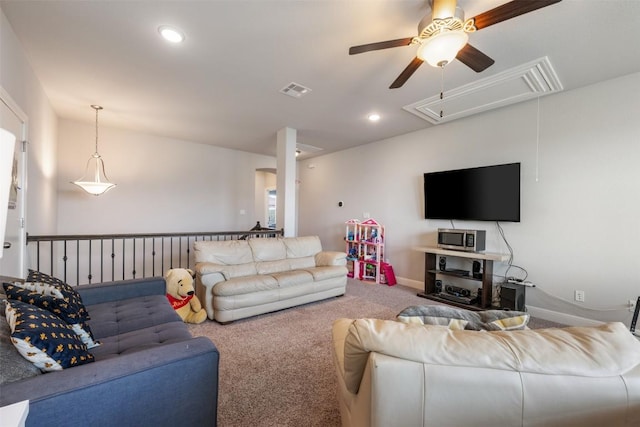 1728 Siena Sunset Rd, Leander, TX 78641 - carpeted living area with attic access, a ceiling fan, baseboards, recessed lighting, and visible vents
