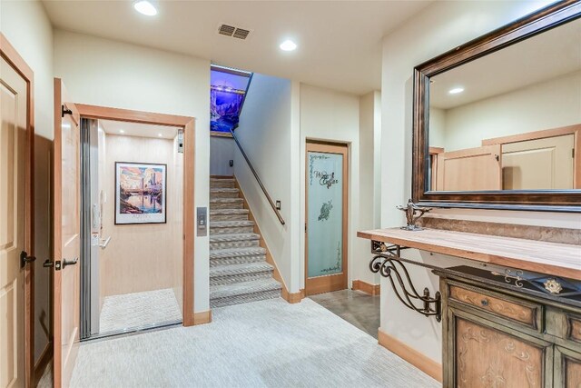 611 N Cuernavaca Dr Unit 301, Austin, TX 78733 - staircase featuring recessed lighting and carpet floors