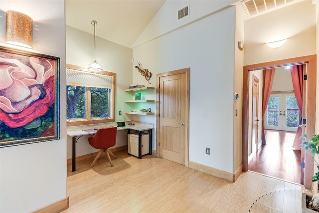 611 N Cuernavaca Dr Unit 301, Austin, TX 78733 - office featuring built in desk, light wood finished floors, plenty of natural light, high vaulted ceiling, and french doors