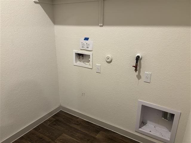 laundry area with hookup for a gas dryer, dark wood-style floors, baseboards, hookup for a washing machine, and laundry area