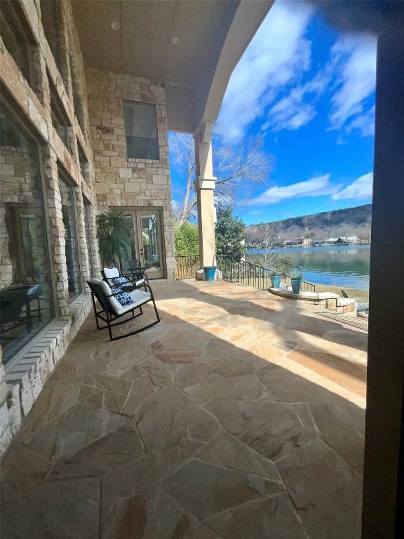 3113 Ski Shores Ter, Austin, TX 78730 - view of patio / terrace with a water view and french doors